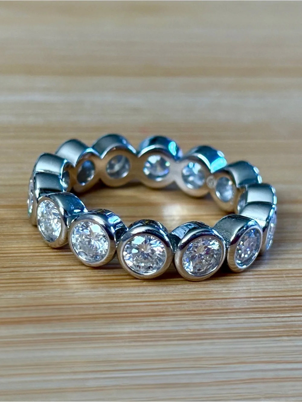 Moissanite eternity ring with .50ct stones in 935 Argentium silver! So sparkly!